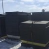 stacks of nested spill containment trays