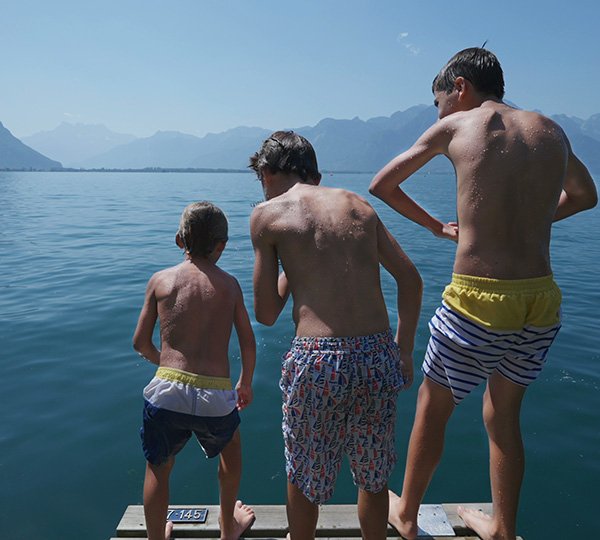 3 boys on a floating dock