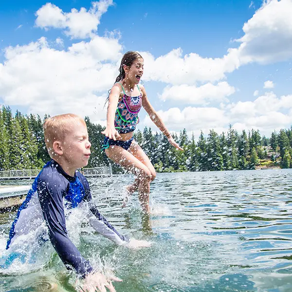 kids jumping in water